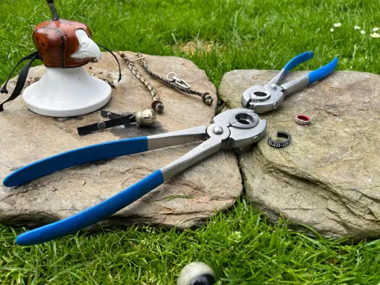 Ring pliers for address rings with other falconry equipment